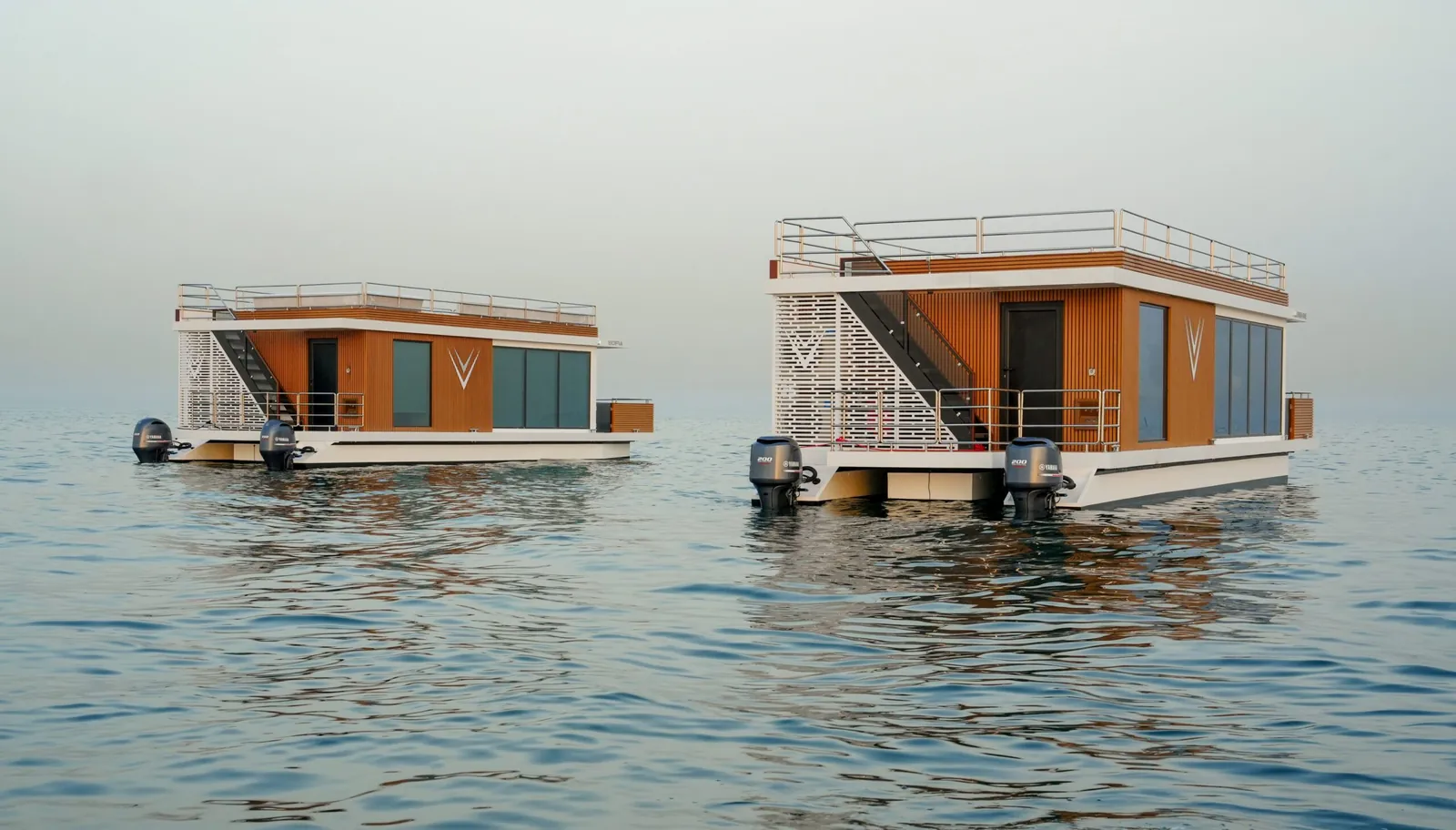Two Aquator 42s at anchor side by side