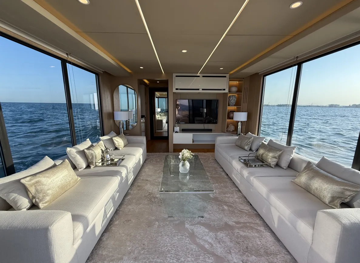 Aquator 28 living space looking aft through the full-width glazing