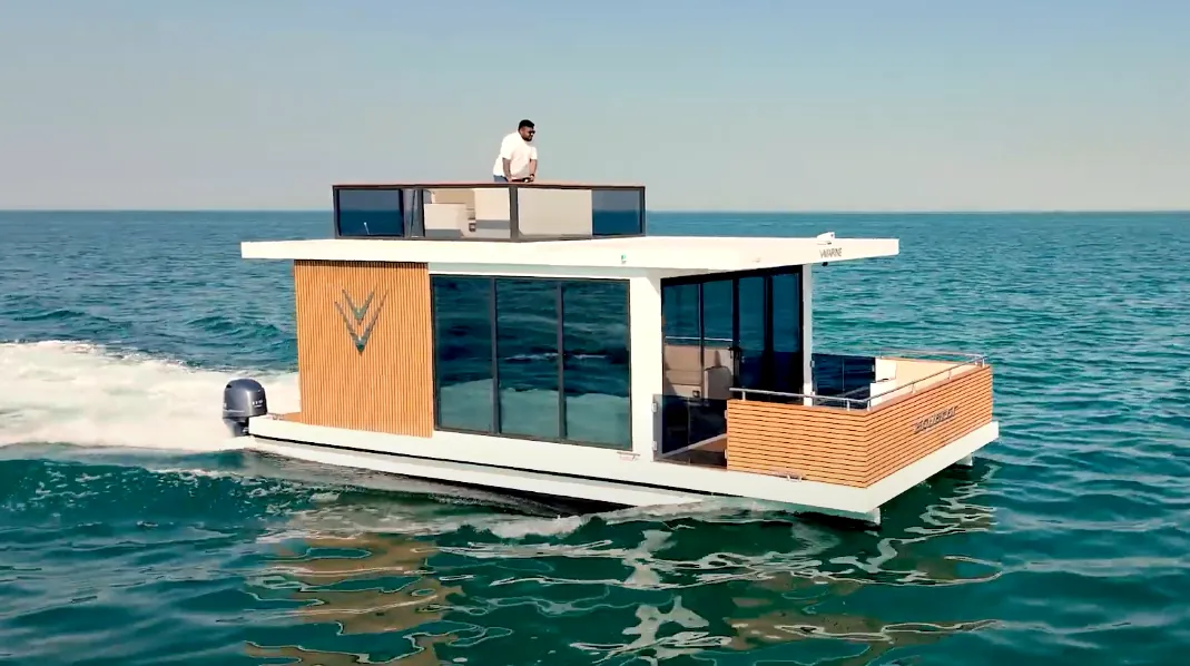 Aquator 28 profile with timber-clad cabin and V-Marine mark