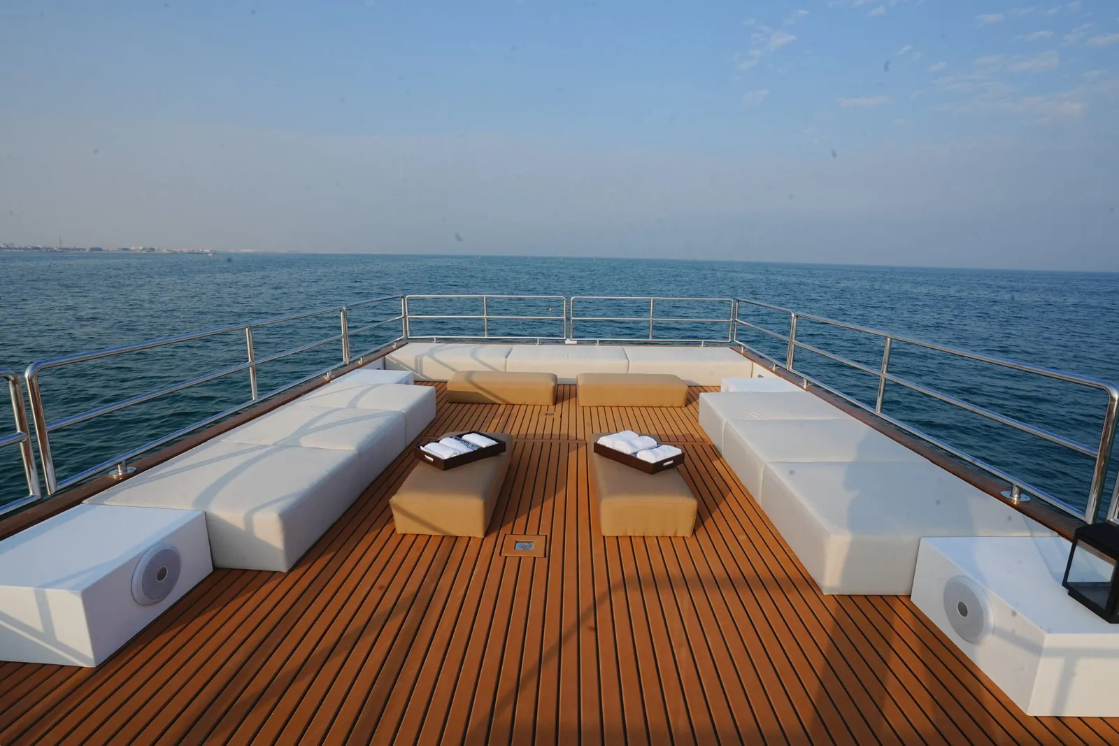 Aquator upper deck with sunbeds on a teak floor