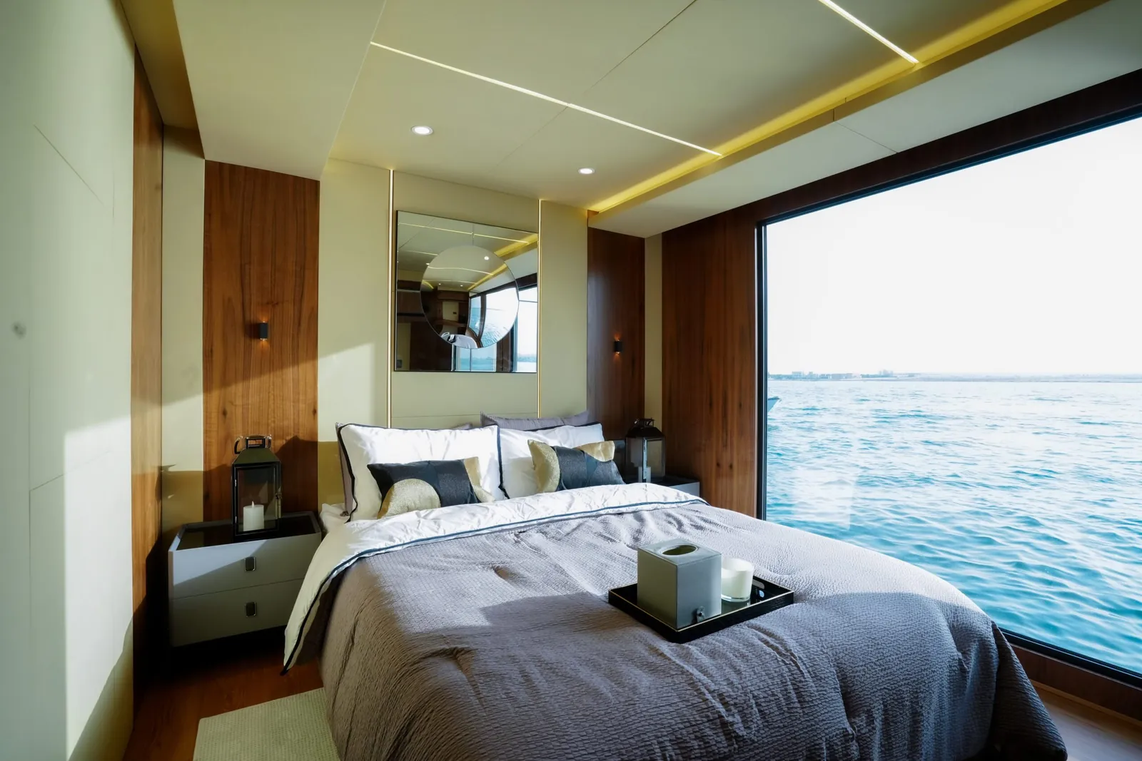 Aquator bedroom with the sea beyond the window